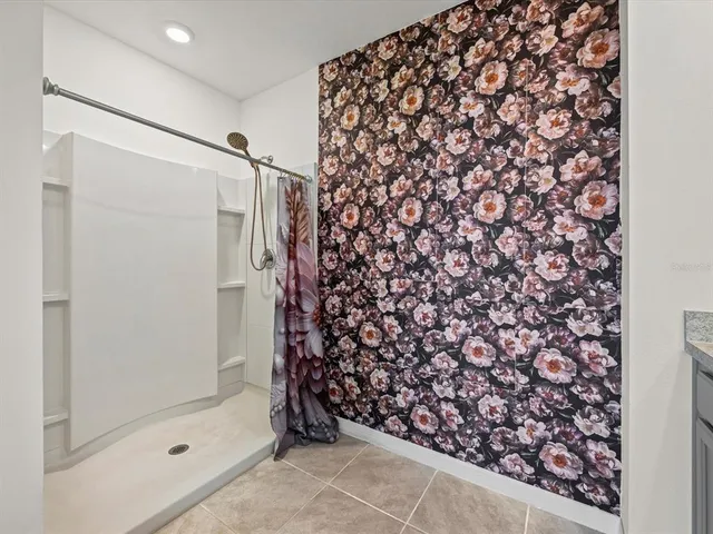 a bathroom with a shower curtain