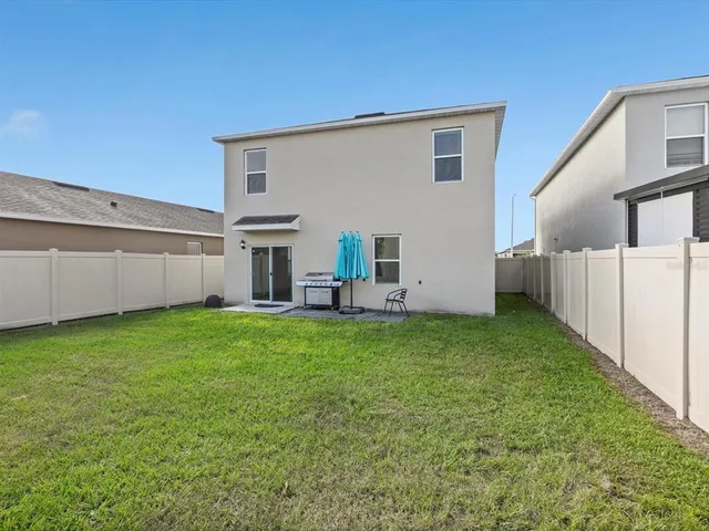 a view of backyard of house