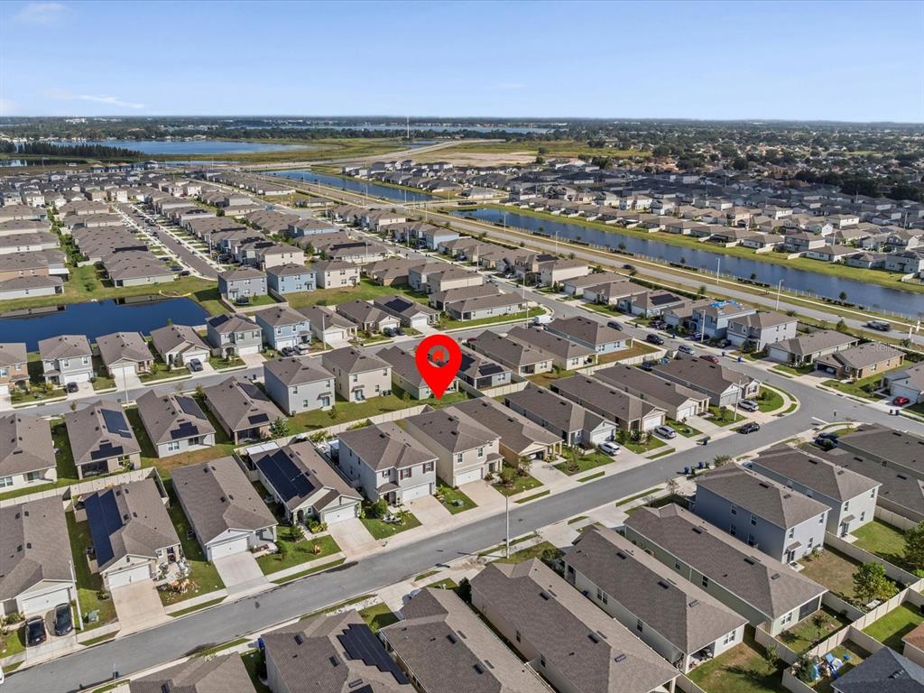 4223 San Rocco Way Winter Haven, FL 33884 - Photo 42 of 47 an aerial view of a city