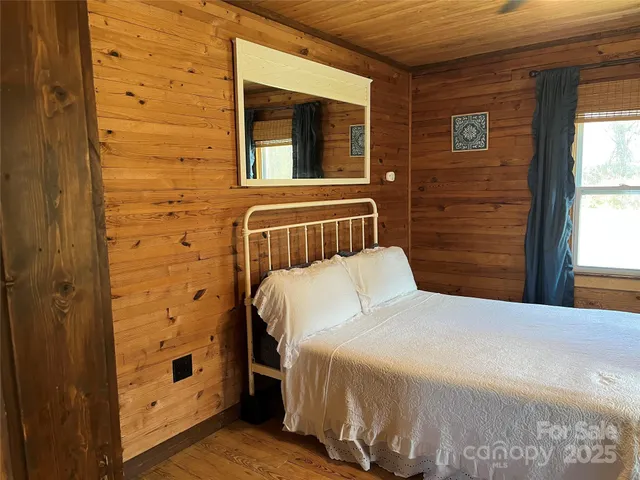 a view of a dining room and livingroom with furniture