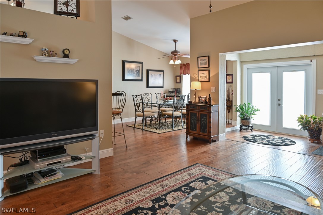 9092 Morris Road Fort Myers, FL 33967 - Photo 5 of 28 a living room with furniture and a flat screen tv