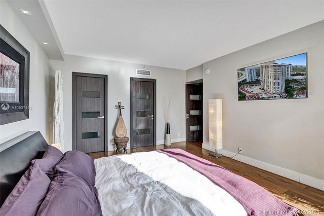 a view of a city with tall buildings