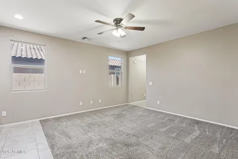a view of a patio with table and chairs and potted plants