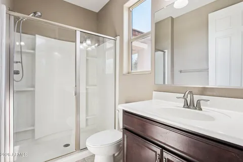 a view of empty space with large trees