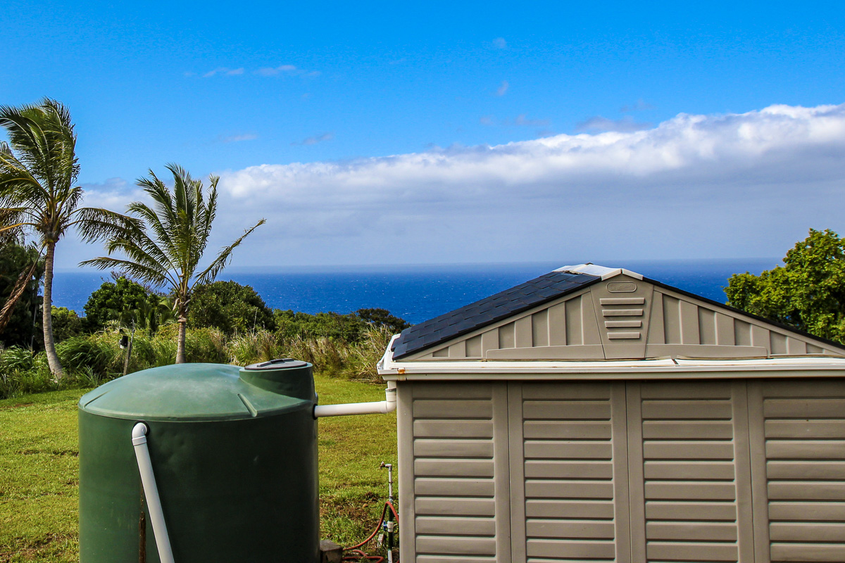 32-351 Lot 1-e Kapena Road Ninole, HI 96773 - Photo 12 of 30 a view of a house with a backyard
