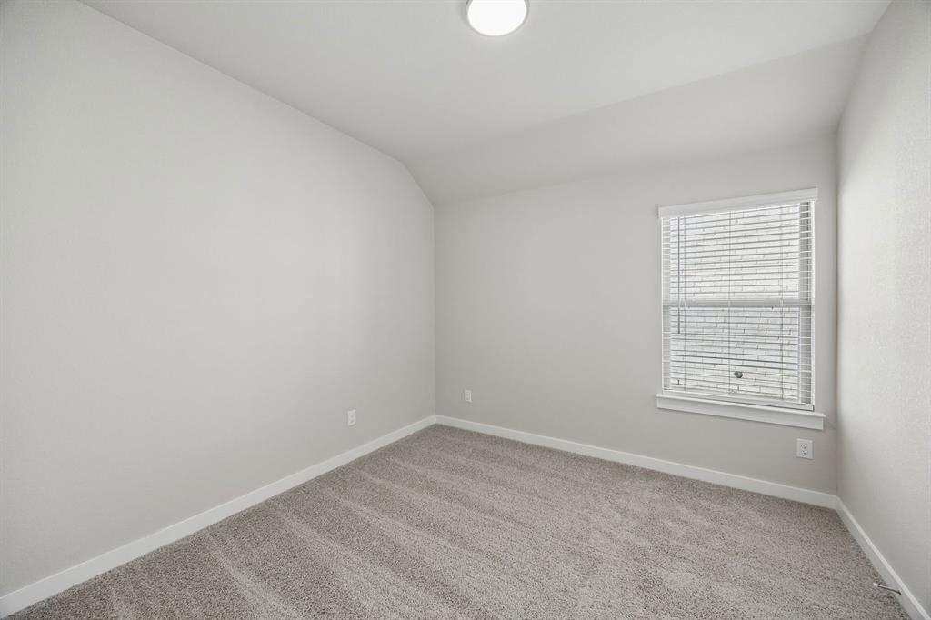 1456 Companero Street Haslet, TX 76052 - Photo 23 of 33 an empty room with a window