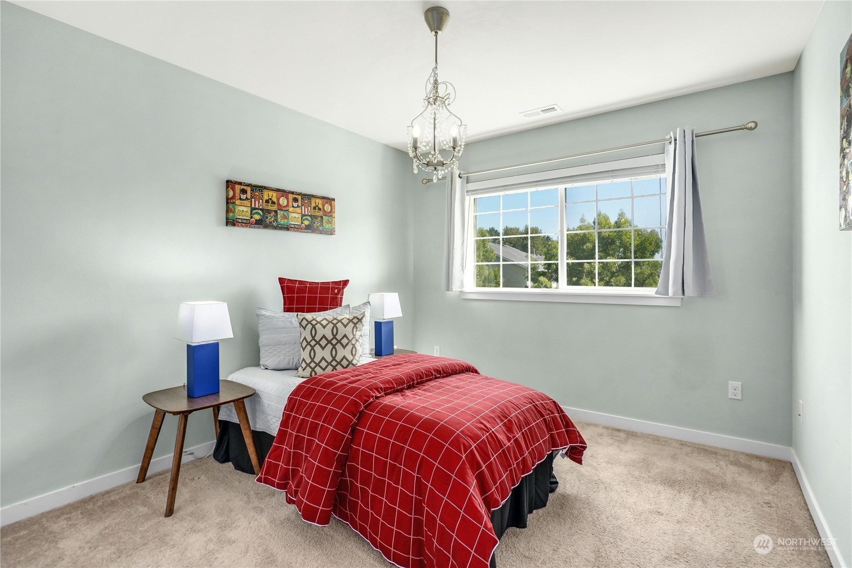 5214 Northeast 7th Street Renton, WA 98059 - Photo 13 of 20 a bedroom with a bed and a window