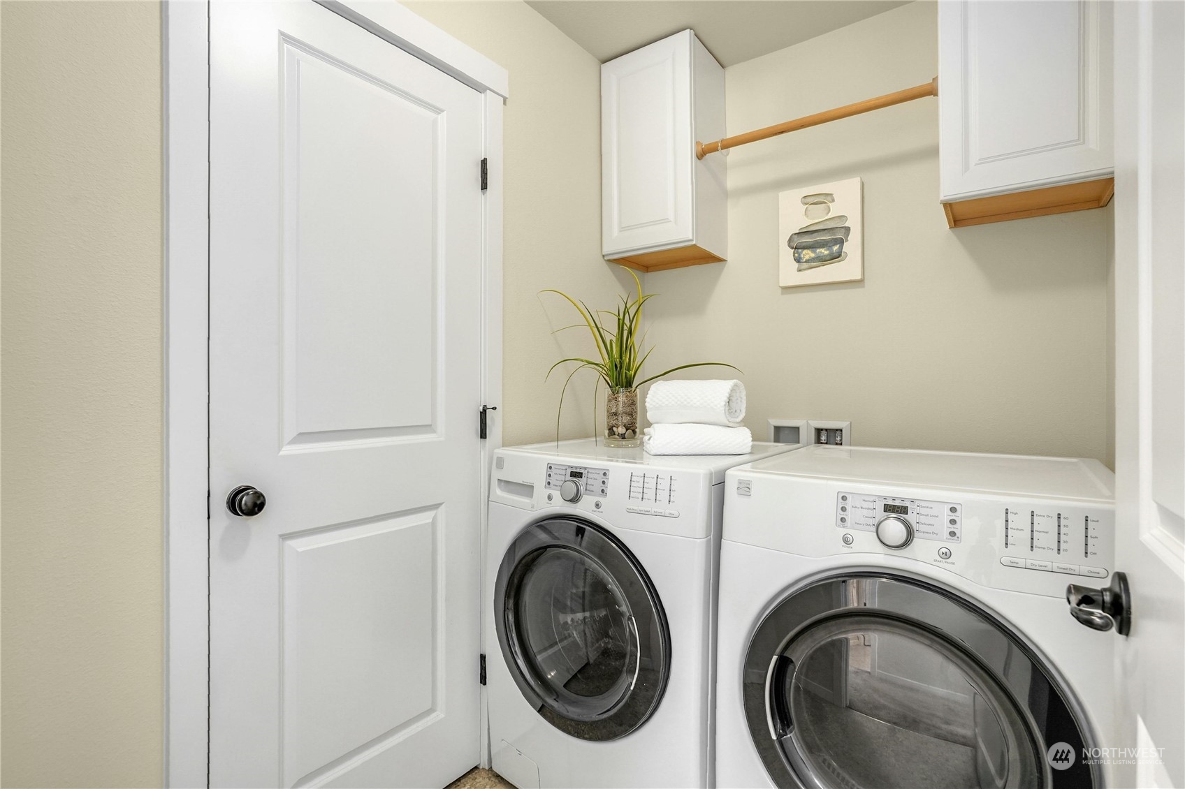 5214 Northeast 7th Street Renton, WA 98059 - Photo 17 of 20 a view of livingroom with washer and dryer