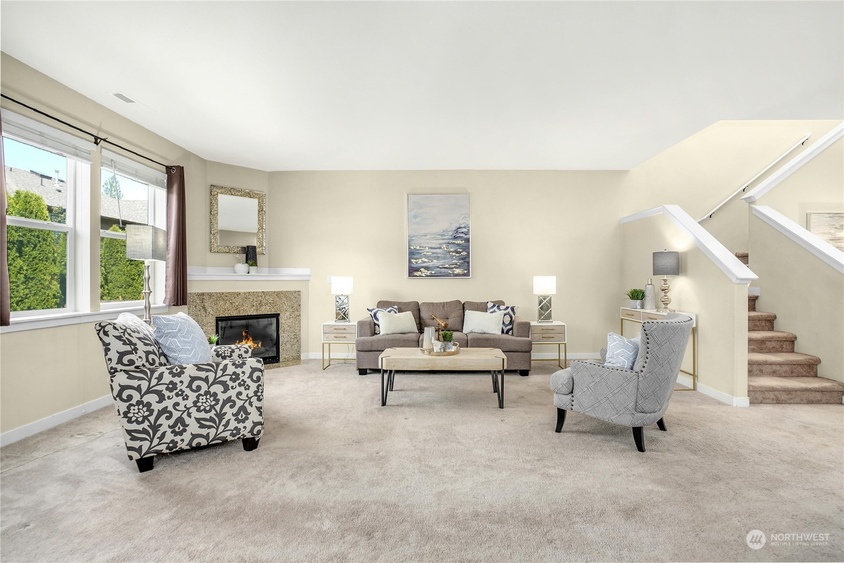 5214 Northeast 7th Street Renton, WA 98059 - Photo 3 of 20 a living room with furniture and a fireplace