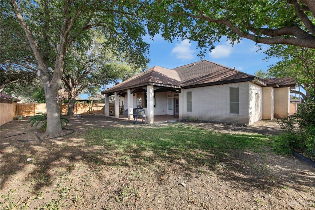 3517 Princess Street Edinburg, TX 78539 - Photo 2 of 22 a house with green field in front of it