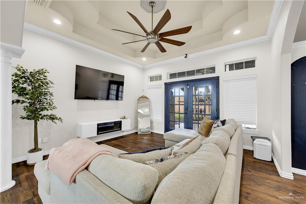 3517 Princess Street Edinburg, TX 78539 - Photo 6 of 22 a bedroom with a bed window and a flat screen tv