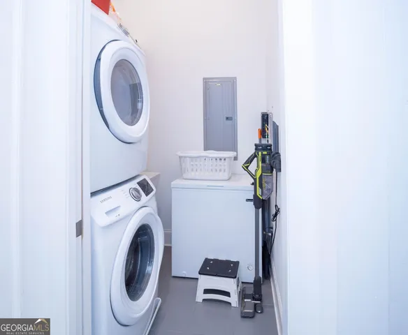 a utility room with dryer and washer