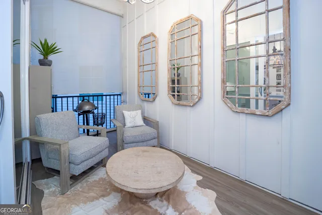 a living room with furniture and a window