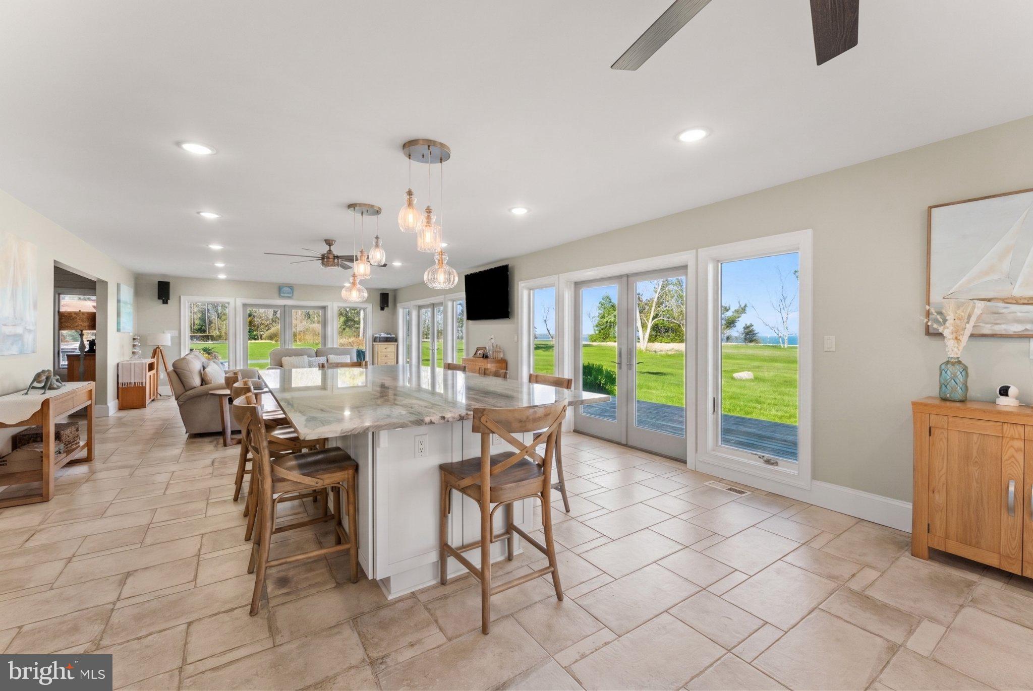 522 Felton Road Deltaville, VA 23043 - Photo 12 of 48 Bright and airy open-concept space.