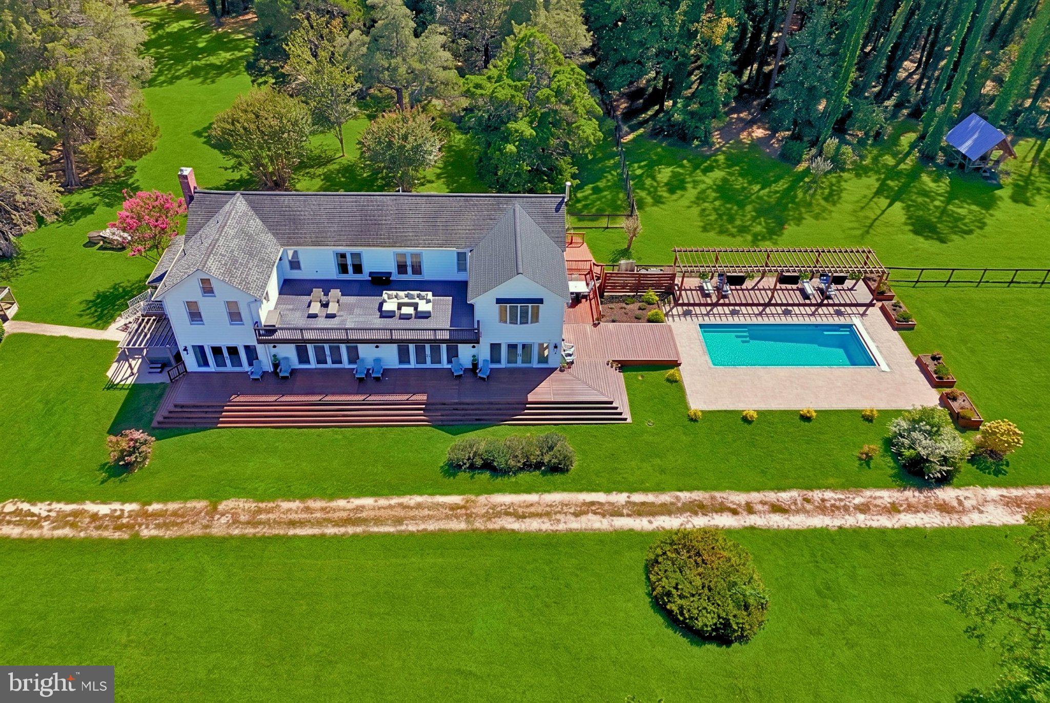 522 Felton Road Deltaville, VA 23043 - Photo 48 of 48 Spacious home with pool and greenery.