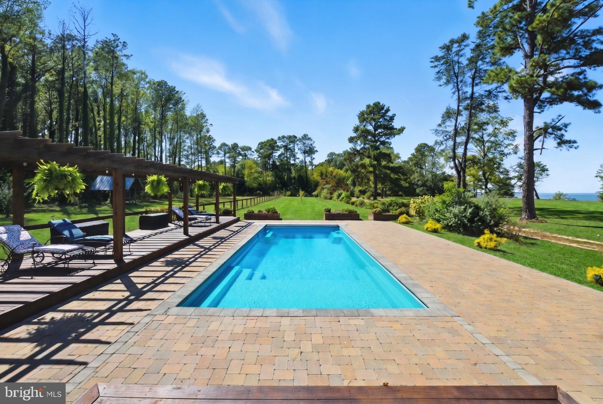 522 Felton Road Deltaville, VA 23043 - Photo 7 of 48 Serene poolside retreat in nature.