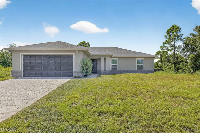 $325,000 | 872 Carbon Street East, Lehigh Acres, FL 33974