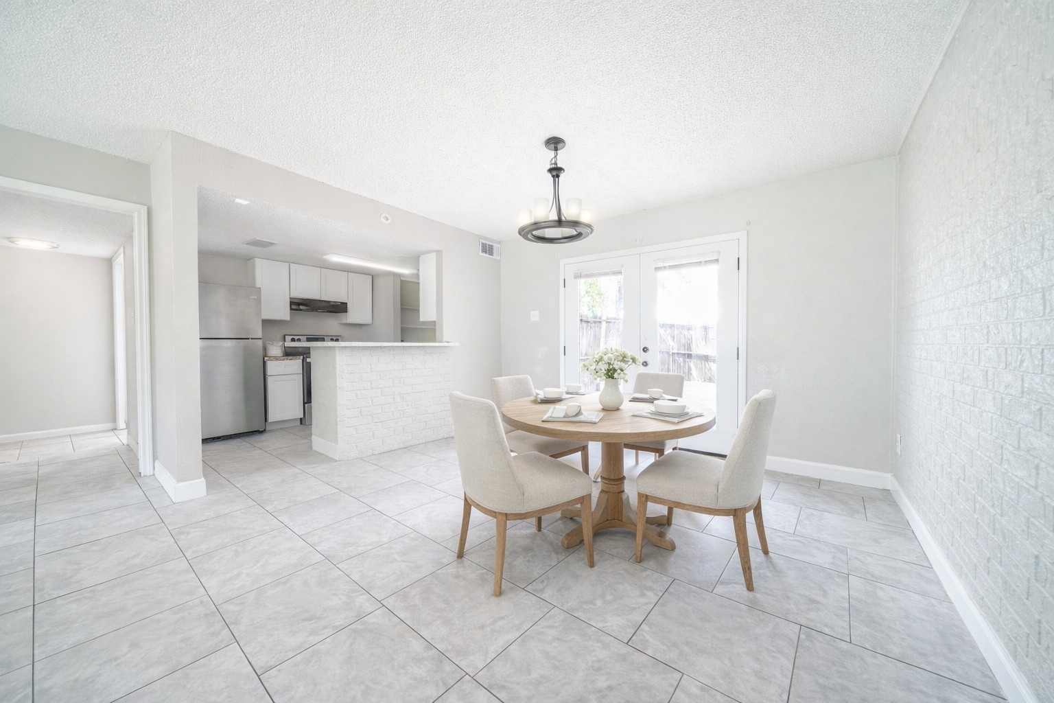 8100 Leonora Street, Unit F4 Houston, TX 77061 - Photo 2 of 11 a view of a dining room with furniture and wooden floor