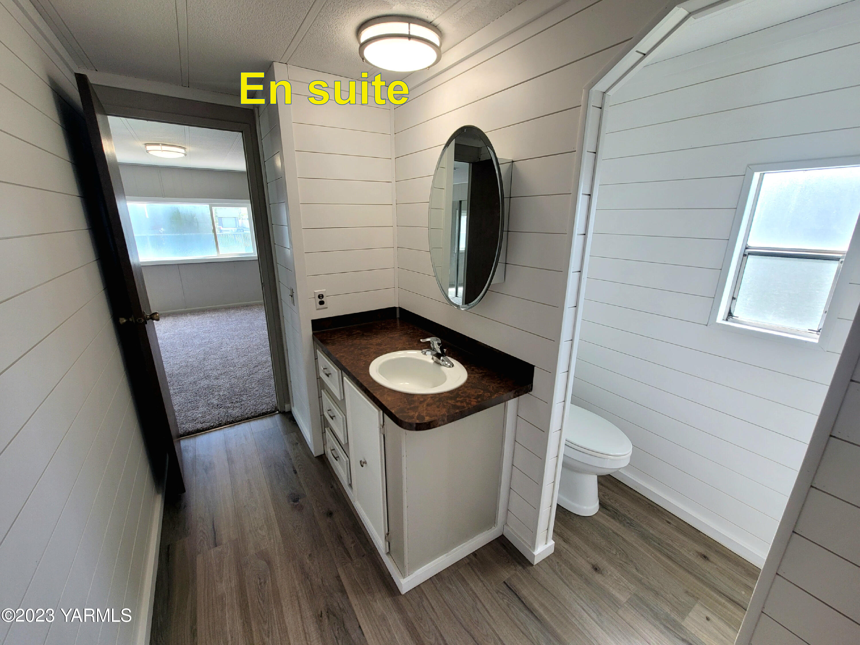 3005 Castlevale Road, Unit 50 Yakima, WA 98902 - Photo 11 of 16 a bathroom with a sink and a mirror