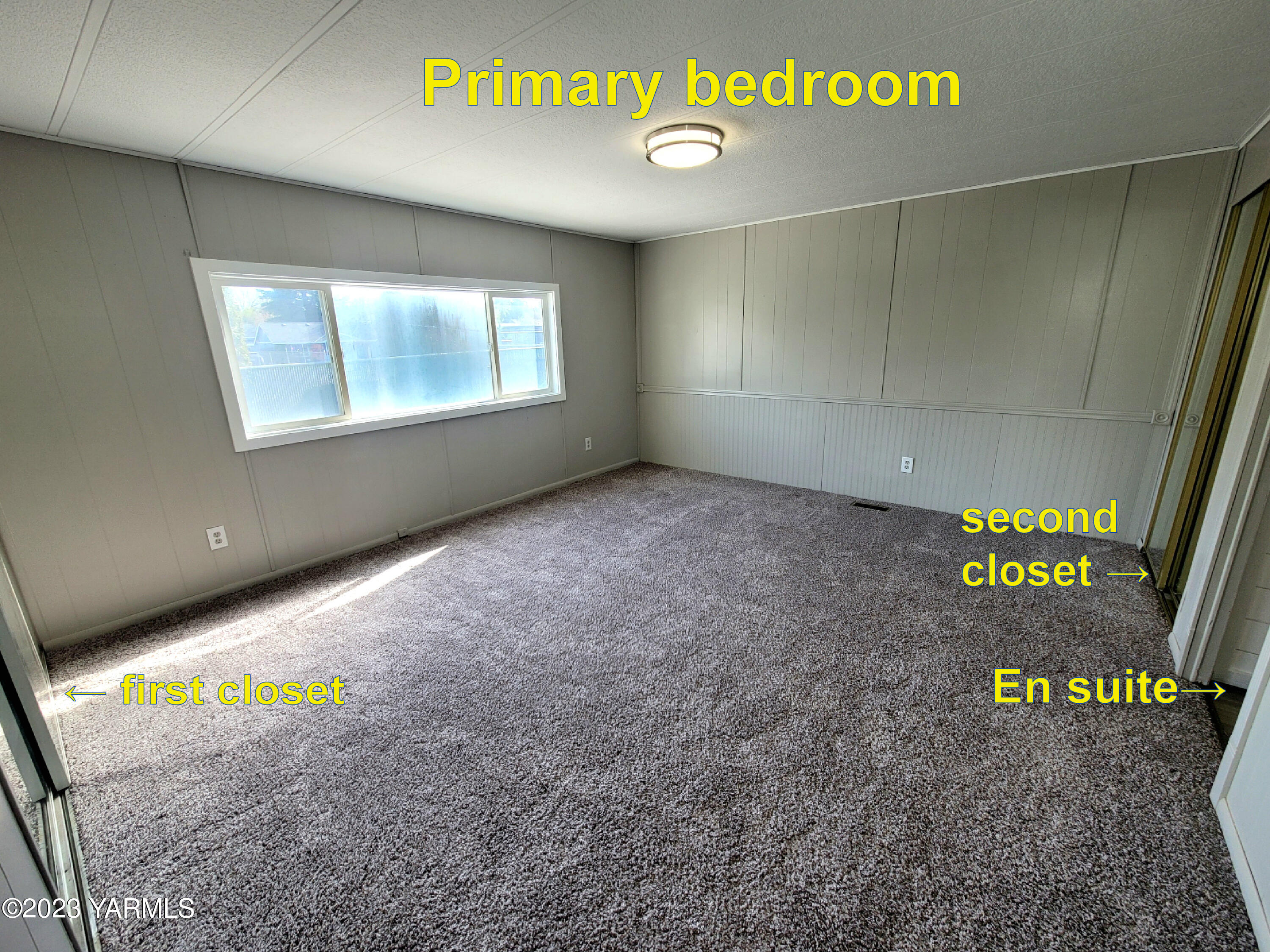 3005 Castlevale Road, Unit 50 Yakima, WA 98902 - Photo 9 of 16 a view of an empty room and a window