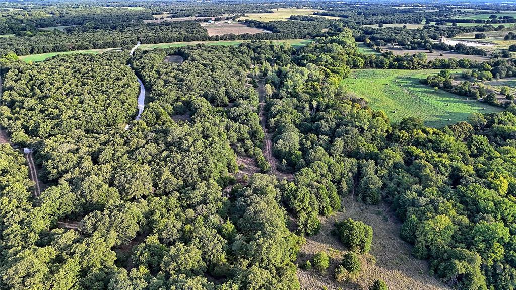 0 Deen Road Bowie, TX 76230 - Photo 19 of 29 an aerial view of a houses with a yard