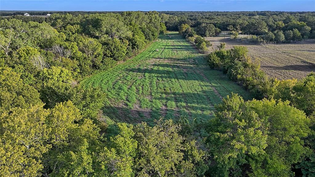 0 Deen Road Bowie, TX 76230 - Photo 26 of 29 a view of a garden with a building