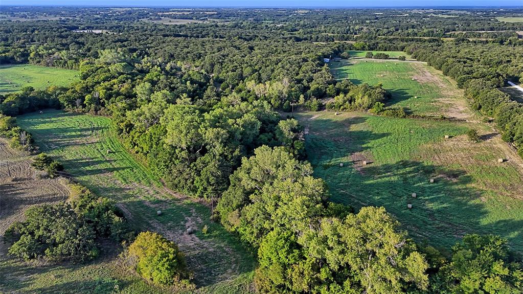 0 Deen Road Bowie, TX 76230 - Photo 28 of 29 an aerial view of a houses with a yard