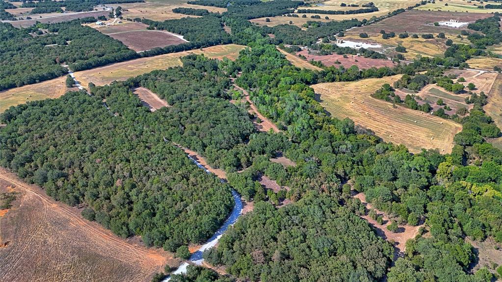0 Deen Road Bowie, TX 76230 - Photo 5 of 29 an aerial view of a house with a yard