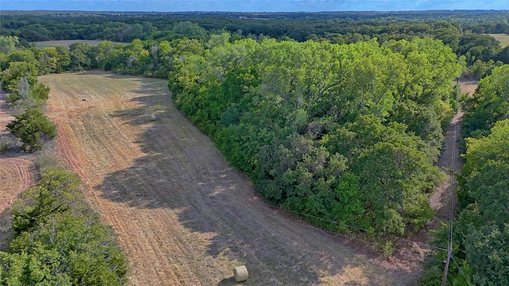 0 Deen Road Bowie, TX 76230 - Photo 7 of 29 a view of a yard with wooden fence