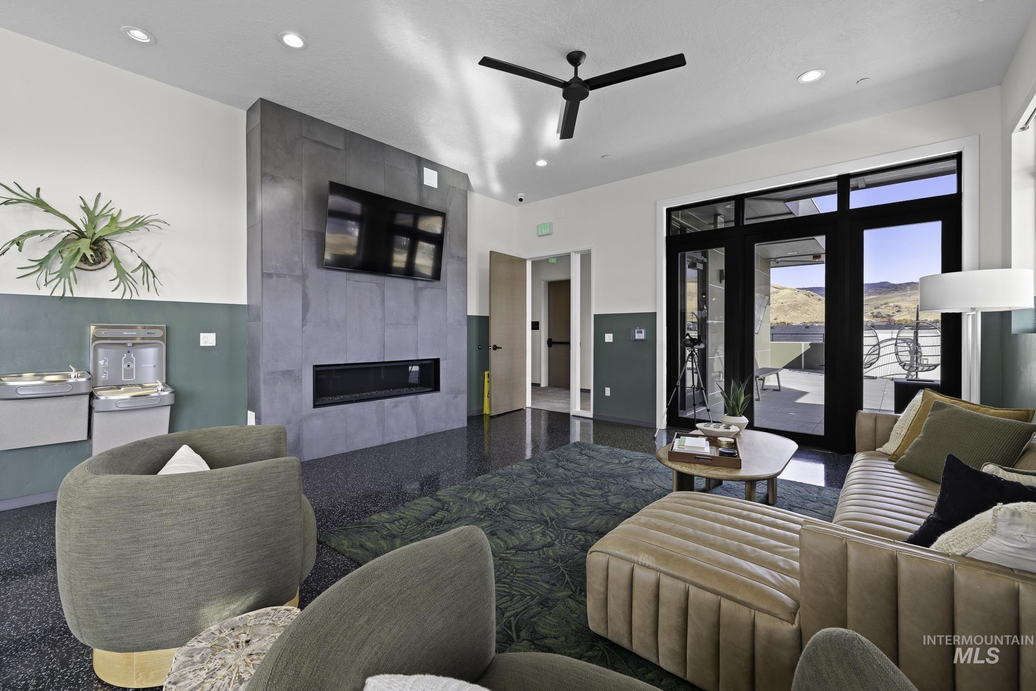 4250 East Haystack Street, Unit 308 Boise, ID 83716 - Photo 22 of 27 Living area with a large fireplace, a ceiling fan, and recessed lighting