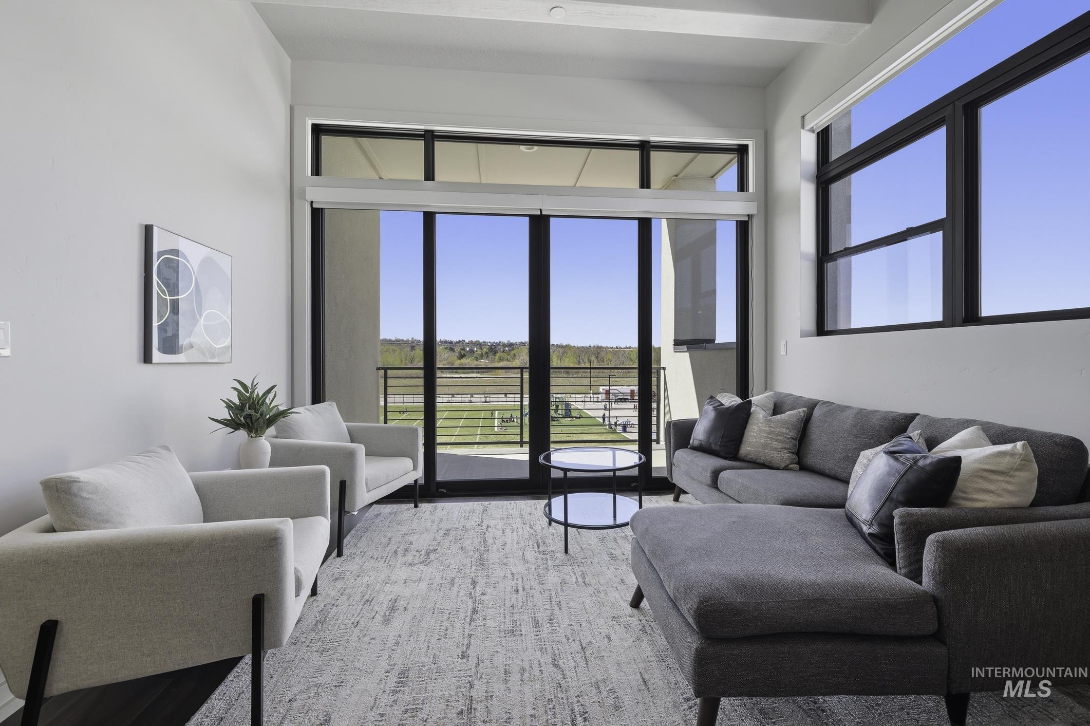 4250 East Haystack Street, Unit 308 Boise, ID 83716 - Photo 4 of 27 Living area featuring plenty of natural light