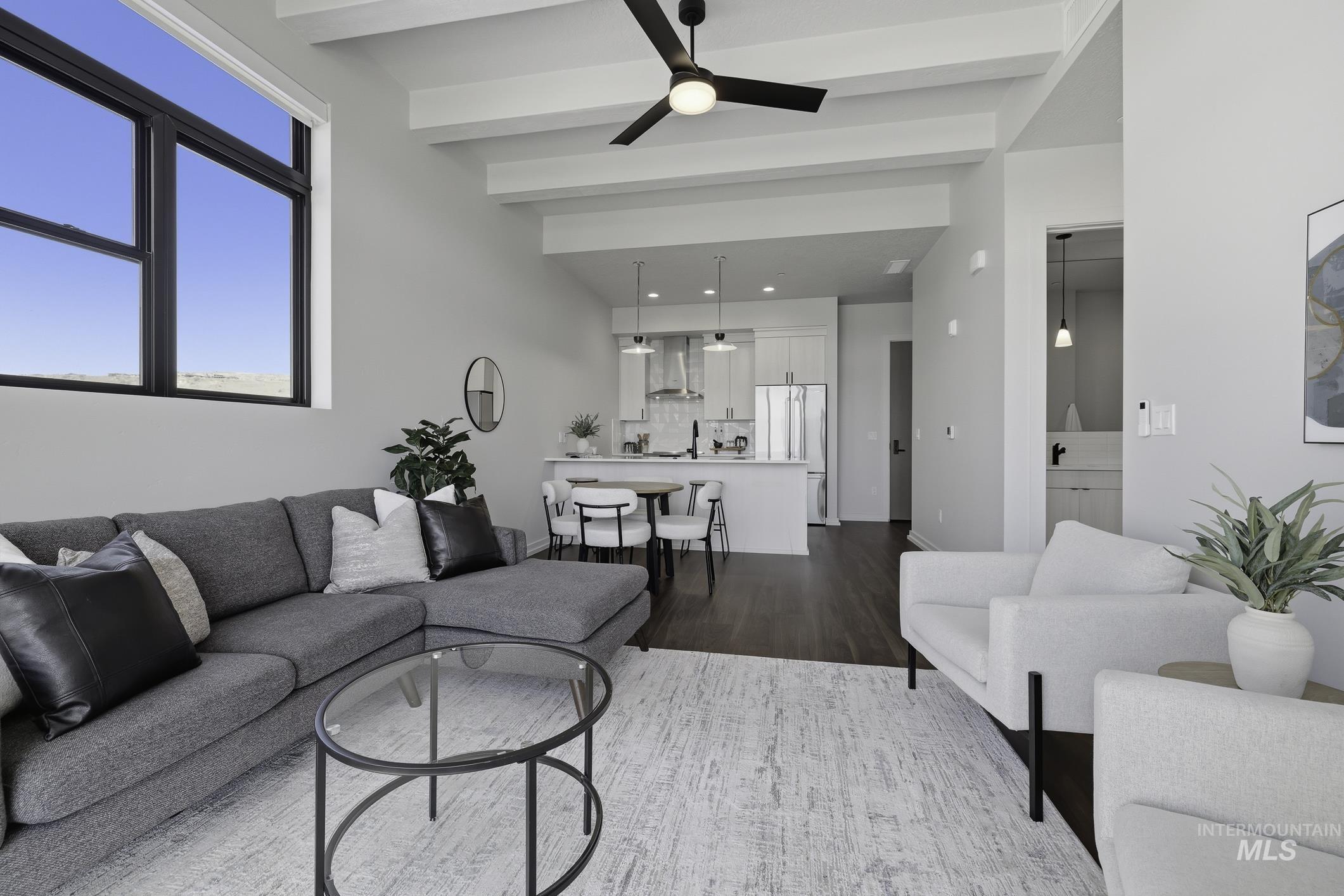 4250 East Haystack Street, Unit 308 Boise, ID 83716 - Photo 6 of 27 Living room with beamed ceiling, dark wood-type flooring, a ceiling fan, and recessed lighting