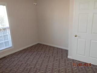 108 Switchboard Road Portland, TN 37148 - Photo 13 of 18 a view of a small space with wooden floor and a window
