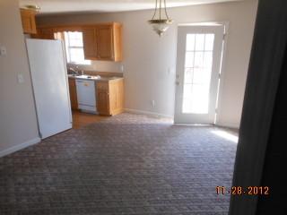108 Switchboard Road Portland, TN 37148 - Photo 10 of 18 an empty room with windows and cabinet