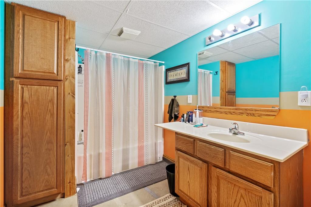 328 Lyons Road Stoneboro, PA 16153 - Photo 16 of 25 a bathroom with a sink and a mirror