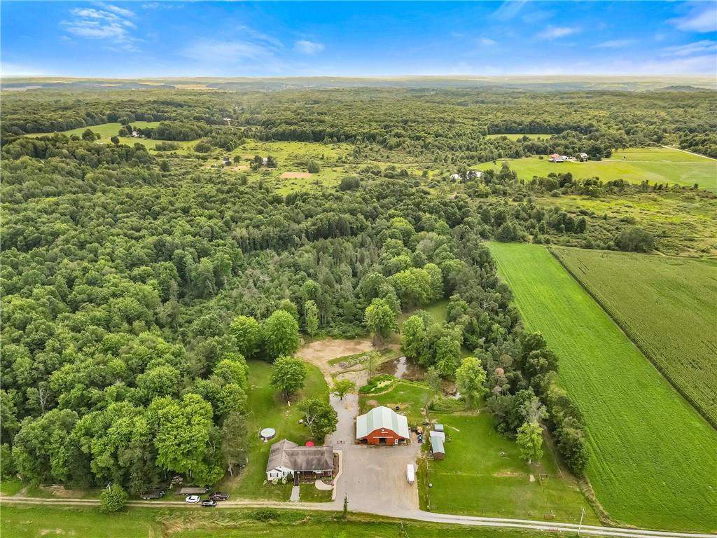 328 Lyons Road Stoneboro, PA 16153 - Photo 25 of 25 an aerial view of residential houses with outdoor space and trees