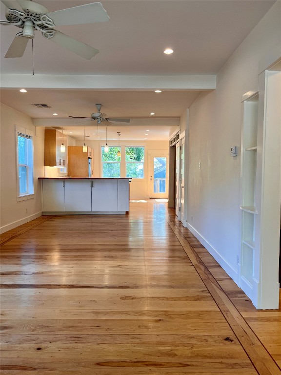 2209 East 18th Street, Unit A Austin, TX 78702 - Photo 5 of 35 Unfurnished living room featuring pecan hardwood, recessed lighting, and ceiling fan