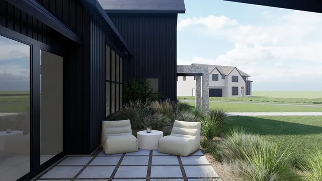 a view of a house with backyard sitting area and garden