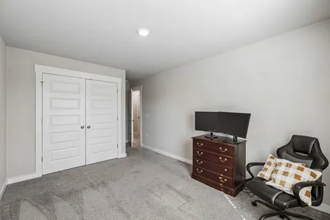 a view of a workspace with furniture