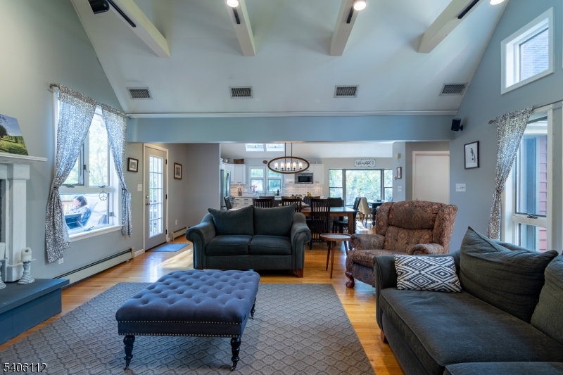 9 Wayside Lane Lebanon, NJ 08833 - Photo 14 of 40 a living room with furniture ceiling fan and a rug