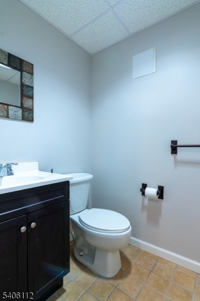 9 Wayside Lane Lebanon, NJ 08833 - Photo 29 of 40 a bathroom with a sink a toilet and mirror