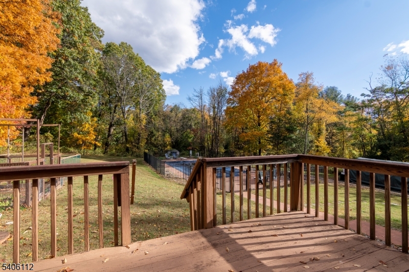 9 Wayside Lane Lebanon, NJ 08833 - Photo 34 of 40 a balcony with wooden floor and fence