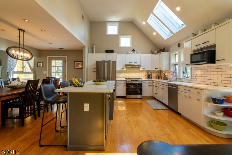 9 Wayside Lane Lebanon, NJ 08833 - Photo 8 of 40 a kitchen with cabinets and wooden floor