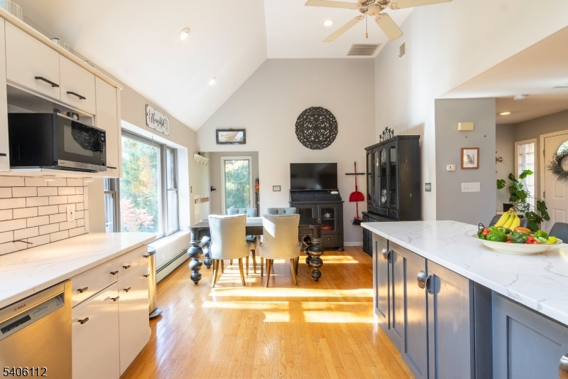 9 Wayside Lane Lebanon, NJ 08833 - Photo 9 of 40 a view of a kitchen and dining area with chandelier