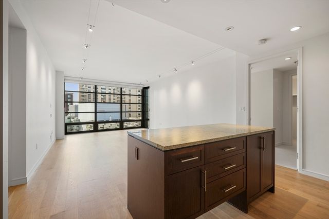 a kitchen with a stove and a microwave oven