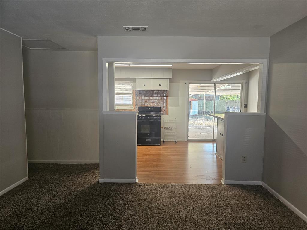 604 East 4th Street Weatherford, TX 76086 - Photo 4 of 20 wooden floor in a room