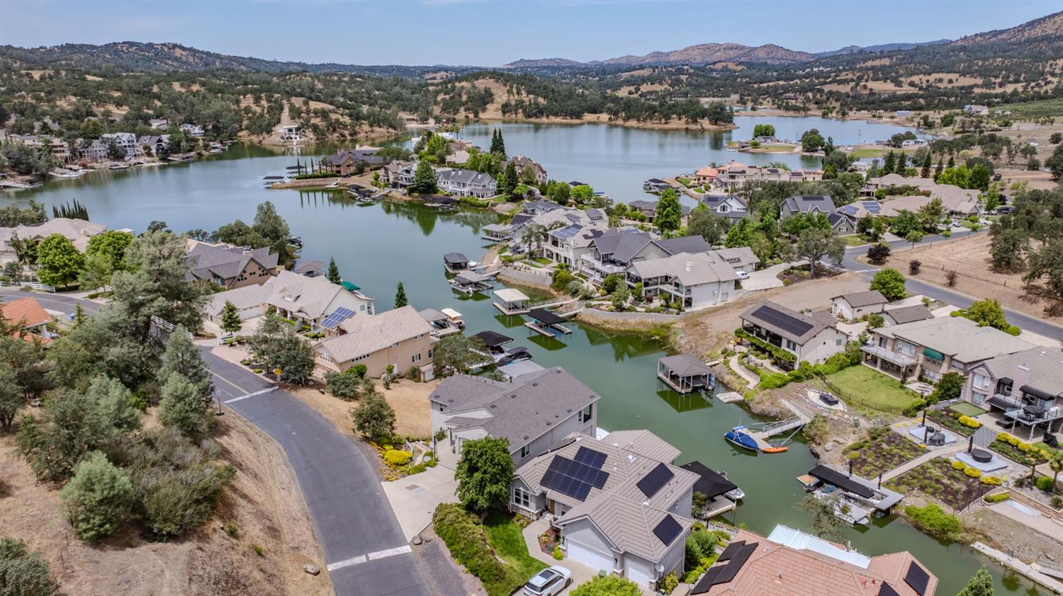 6066 Bluff View Road Copperopolis, CA 95228 - Photo 7 of 96 an aerial view of lake and residential houses with outdoor space