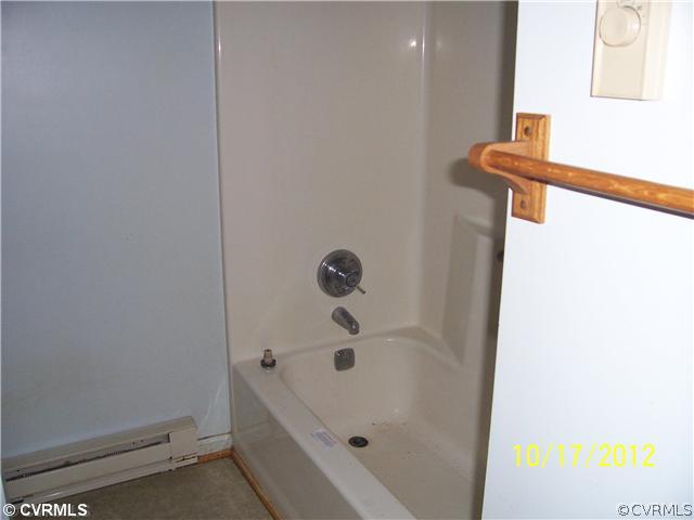 12812 Ruth Hill Road Church Road, VA 23833 - Photo 11 of 12 a bathroom with a bathtub