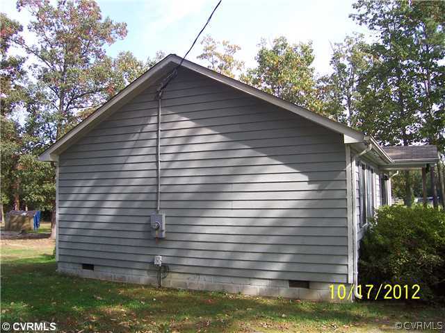 12812 Ruth Hill Road Church Road, VA 23833 - Photo 4 of 12 a backyard of a house