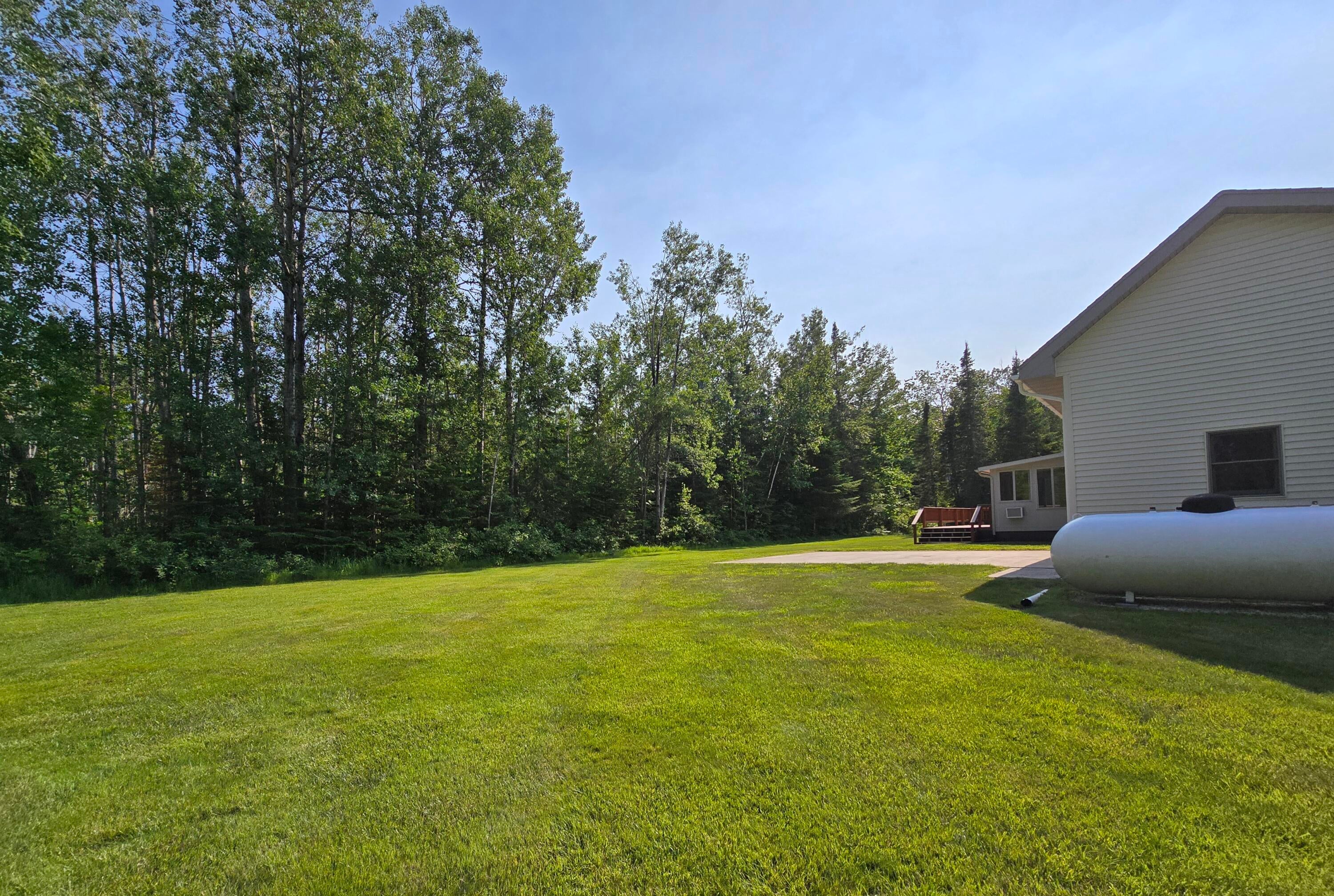 N705 Woods Road St. Ignace, MI 49781 - Photo 64 of 75 Side yard